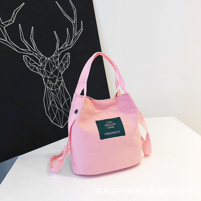 Women's bag new letter bucket canvas bag trend single shoulder cross arm portable children's bag mobile phone