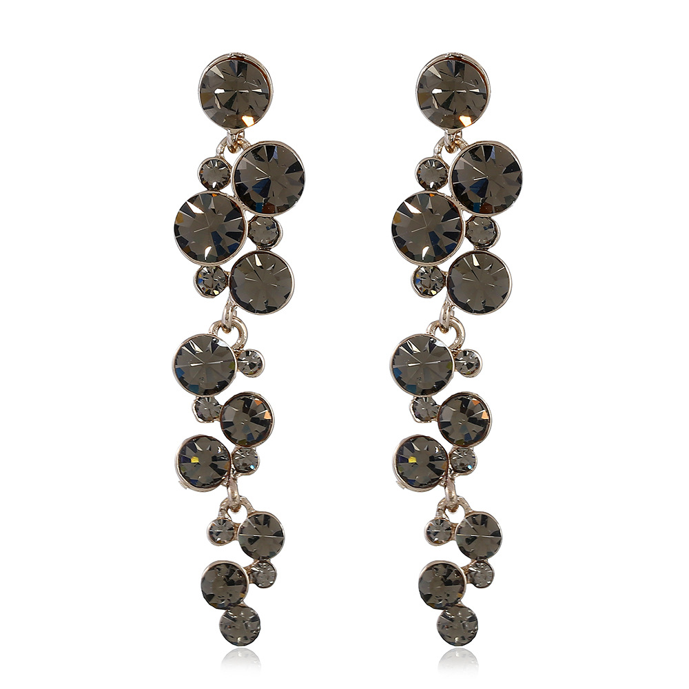 Elegant fashionable long earrings with tassels