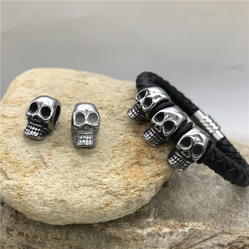 Foreign trade website hot European and American pop punk hand woven beaded skull leather bracelet