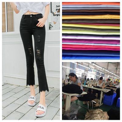 东莞女装实力工厂加工定制破洞毛边微喇叭牛仔裤九分裤梭织包工包