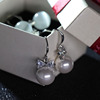 Zirconium with bow, sophisticated fashionable earrings, silver 925 sample, Korean style, cat's eye