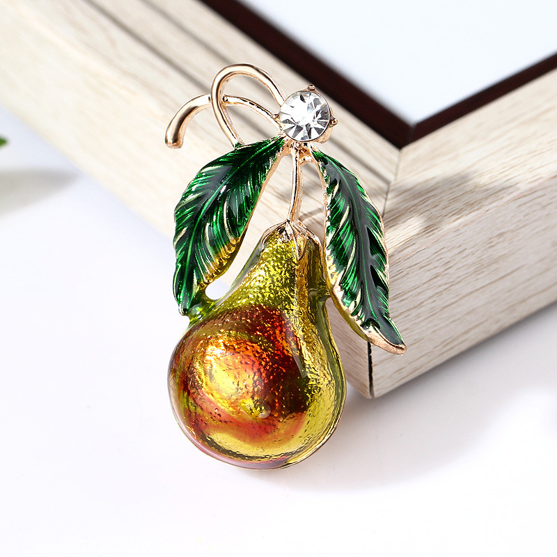 Spilla a forma di zucca in smalto e lega accessorio elegante_voghion.com