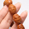 Factory wholesale olive core carving is full of heart to the Buddha's red leather old oil nucleus, quiet heart, small sand Madiwen, play olive nucleus