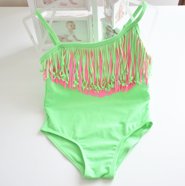 Green oblique shoulder long tassel body