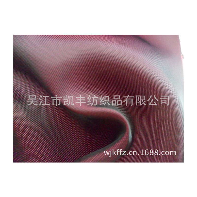 68D*120D双色斜纹涤粘人丝里布人造丝女装风衣夹克面料经典