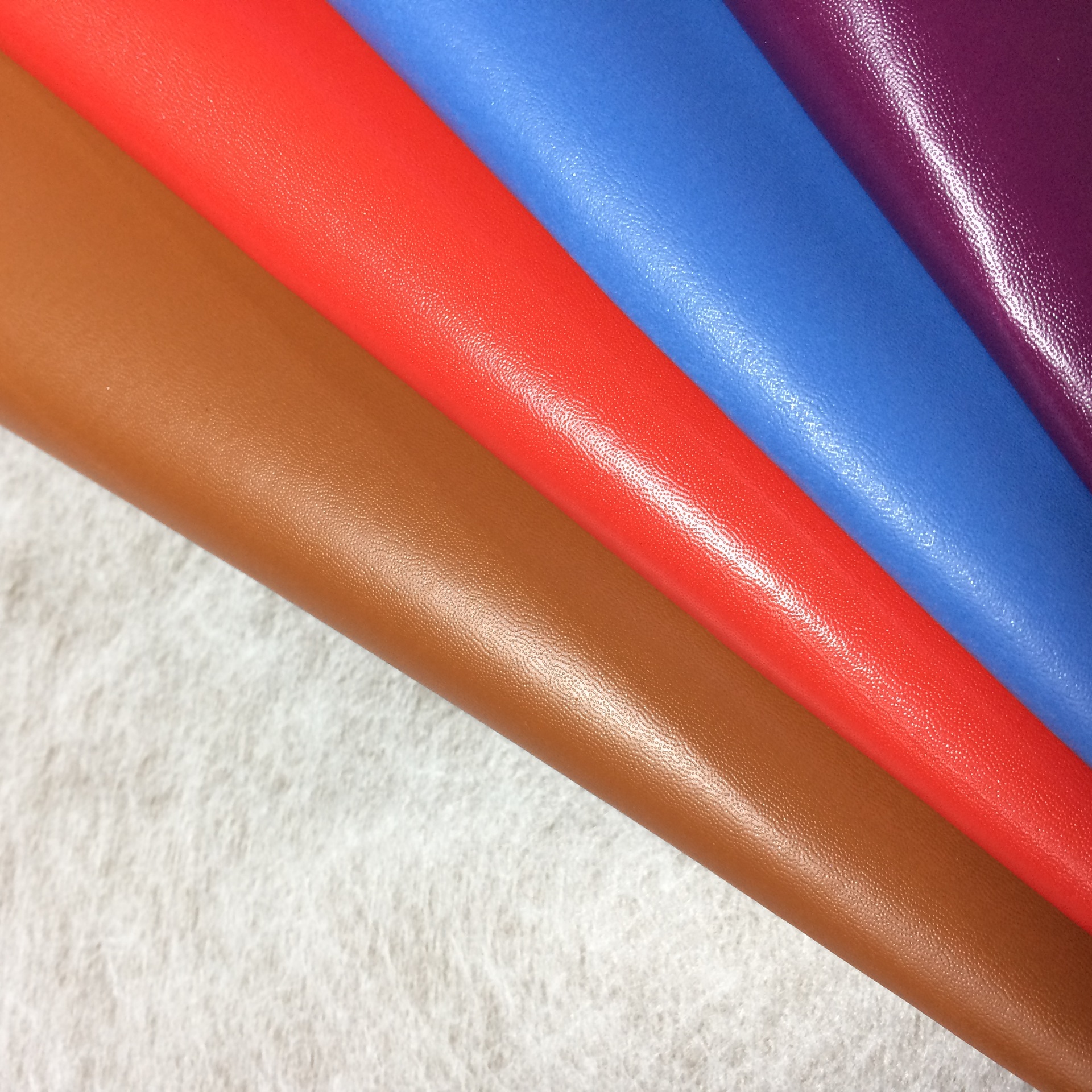 厂价直销箱包包装文具用水刺底0.5厚138纹消光薄款PVC义乌人造革