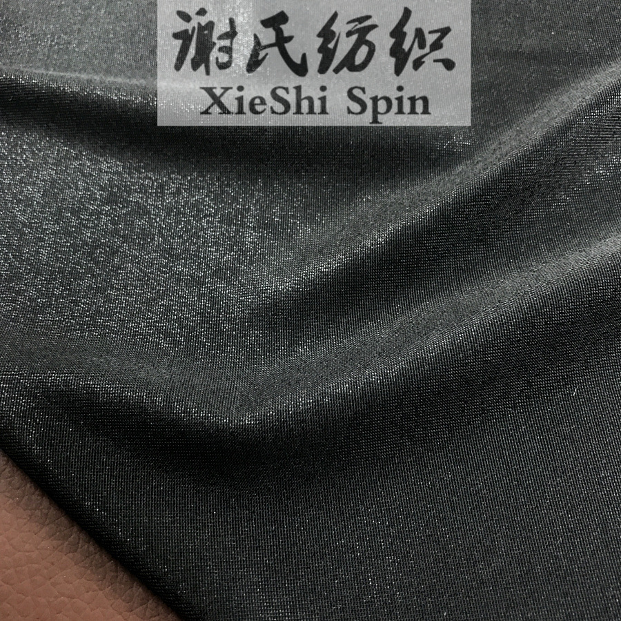 春夏电光布料 黑色电光烫金柔软弹力金属色面料 泳装包臀裙面料