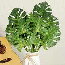 高档仿真7头春芋叶龟背叶婚庆绢花配草花材酒店家居摆件装饰过胶