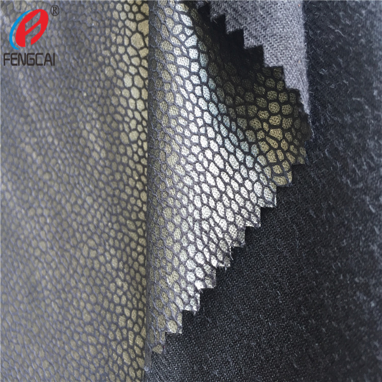 专业供应各种经编麂皮绒 涤纶麂皮绒烫金 用于服装鞋材面料