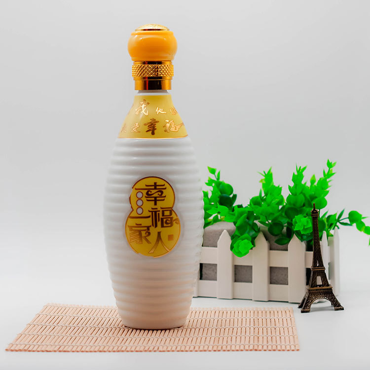 乳白料烤花酒瓶一斤装白瓷瓶烤黄花金字 内容可制作郓城酒瓶