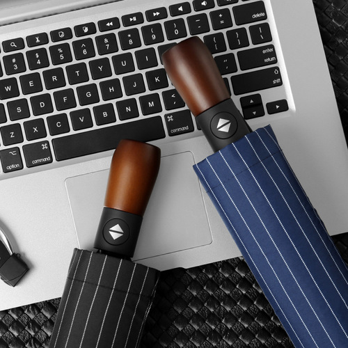 Fully automatic solid wood handle umbrella ten-bone windproof umbrella three-fold fair or rainy folding umbrella men's high-end business advertising umbrella