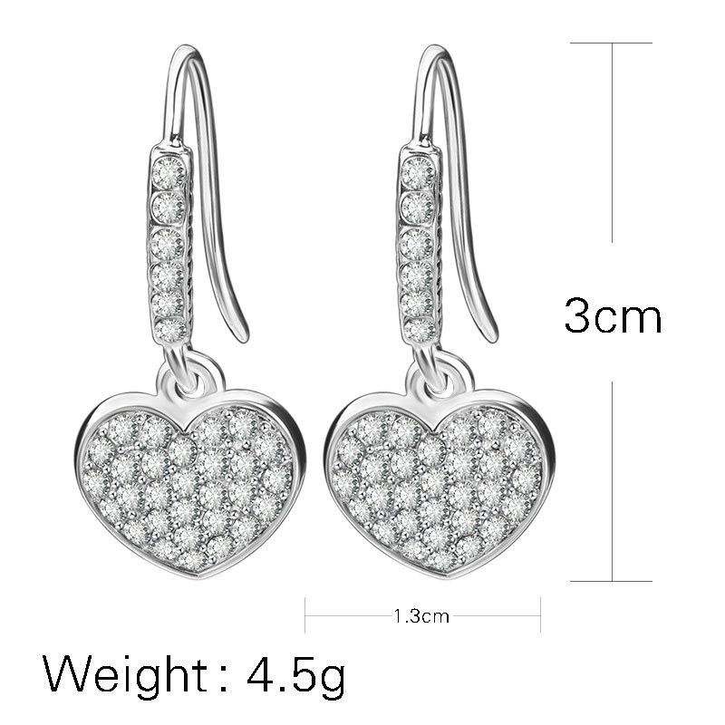 Aretes Plateados Simples Y Elegantes Llenos De Diamantes Con Forma De Corazón Y Gancho Para El Oído display picture 3