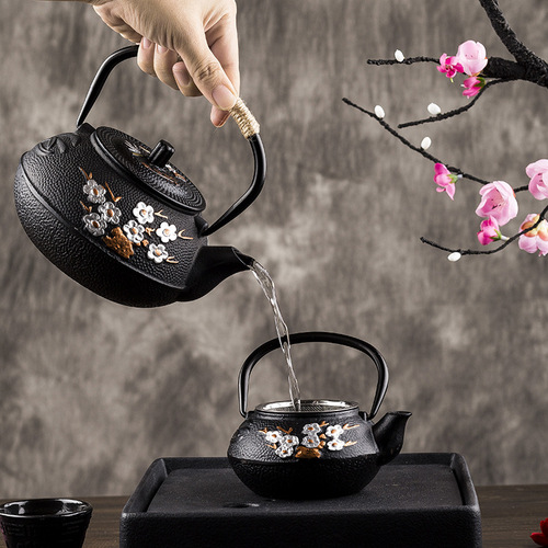 Japanese exquisite plum and bamboo handmade cast iron kettle for boiling water and making tea household teapot tea set with filter manufacturer iron kettle wholesale