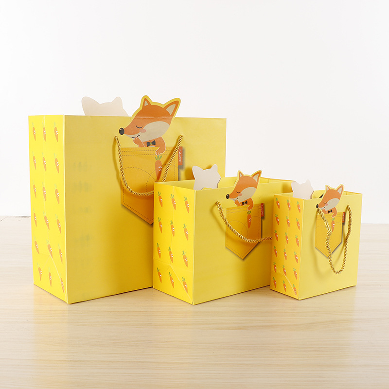 Wholesale Cartoon Animal Pattern Children&#39;s Day Gift Tote Bag Cute Yellow Little Fox Folding Paper Gift Bag display picture 1