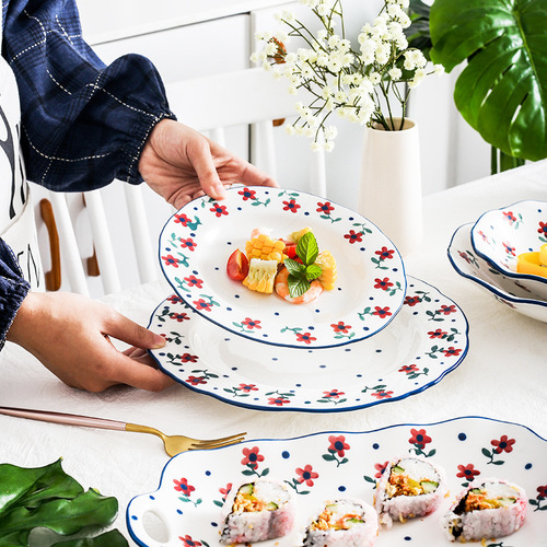 Japanese-style hand-painted small flower ceramic tableware set, including rice bowl, soup bowl, plate, western-style plate, mug, saucer, and soup spoon for home use.