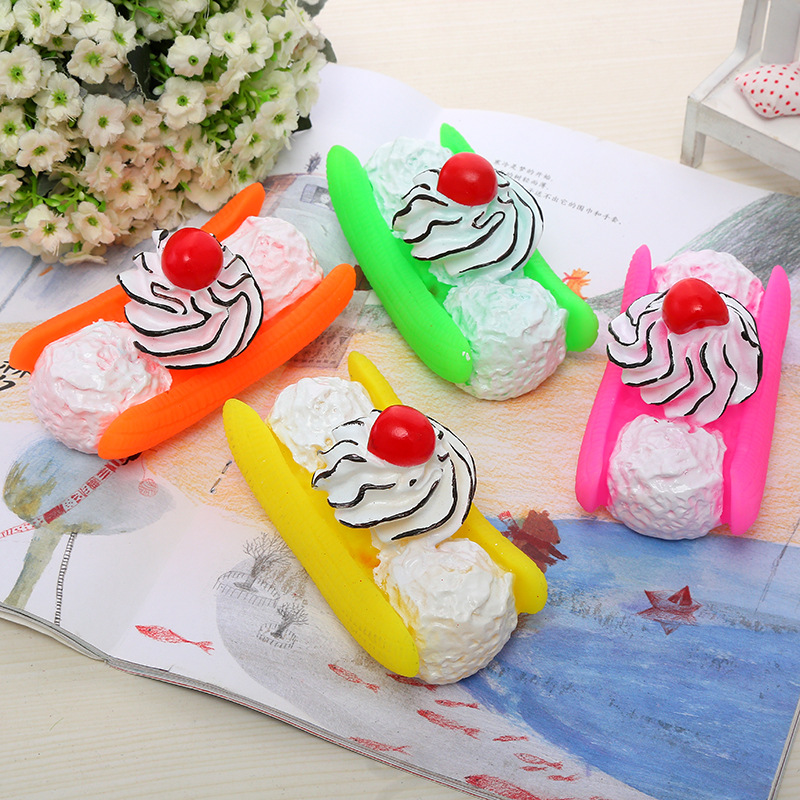 Fábrica al por mayor nuevo perro plátano fruta barco mordedura vinilo juguete mascota molar diente limpieza creativo perro divertido