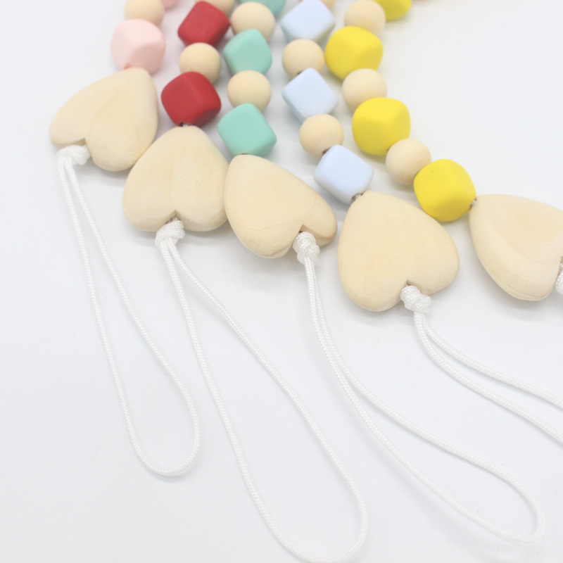 Europeo y americano nuevo bebé chupete cadena mordedor anti-gota chupete clip niños molar anti-perdido cadena Amazon