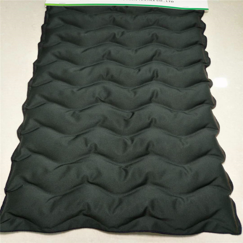 50D高弹春亚纺五合一中空PU复合通道布充绒布羽绒服防寒服面料