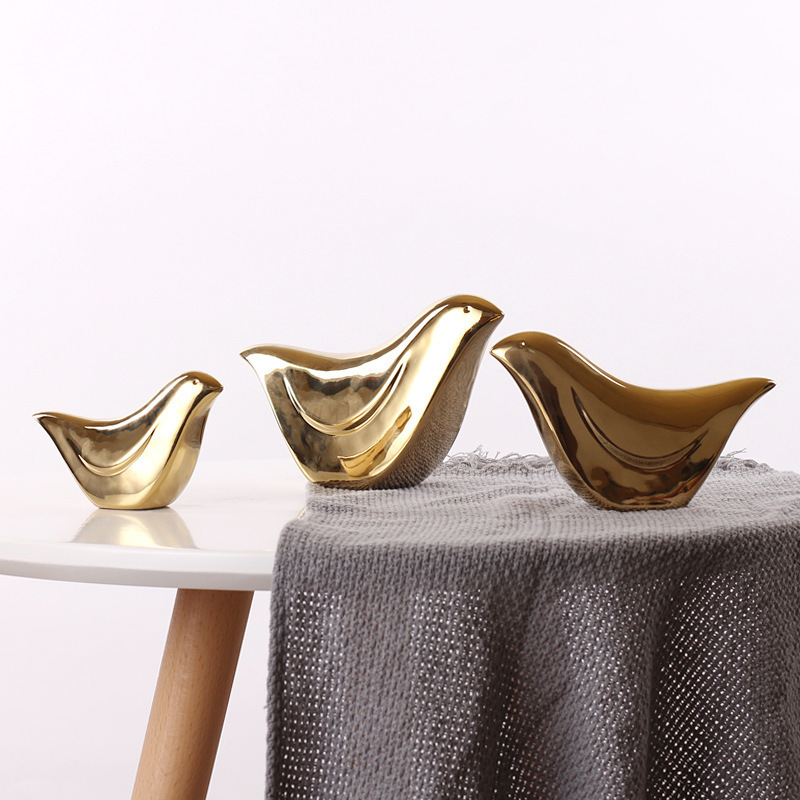 Nórdico creativo pájaro de cerámica hogar Oro suave decoración personalidad Linda pequeña decoración fábrica al por mayor