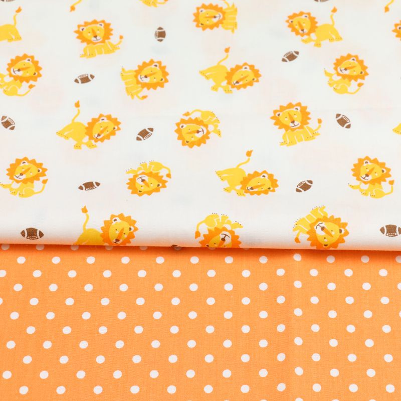幼儿园宝宝卡通小狮子印花布料全棉布 纯棉手工布料 包被睡袋面料