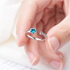 Blue fresh ring, on index finger, Japanese and Korean