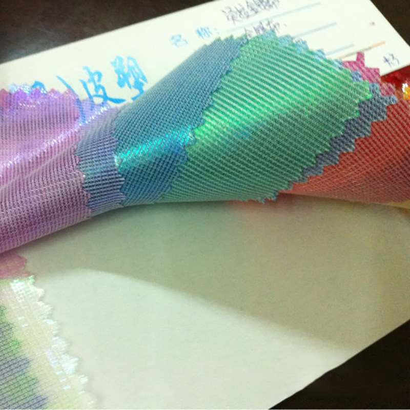 厂家直销幻彩布针织底幻彩膜幻光镭射彩虹布舞台表演装饰服装辅料