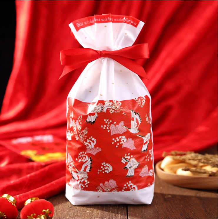 新年福袋雪花酥束口抽绳袋牛轧饼干点心糖果年货礼品扎口包装