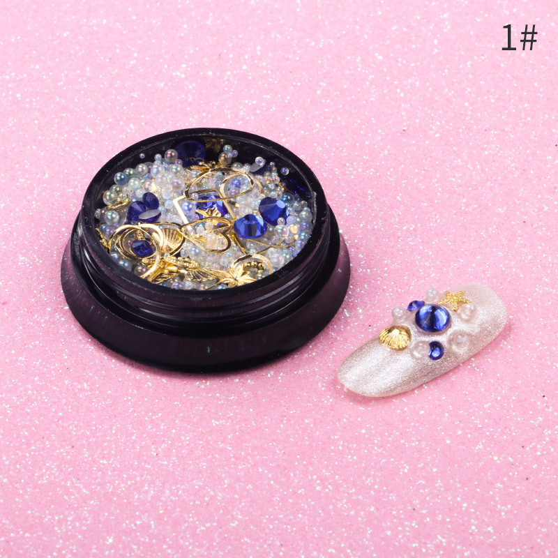 Joyas de belleza de uñas de la estrella y la luna, remaches de estampado de oro, bolas de acero mezcladas con anillo de metal, diamante de agua, diafragma de aleación hueca japonesa