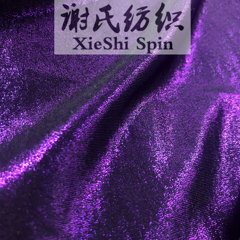 新春夏弹力布料 电光紫色闪点涂金柔软金属色面料 泳装包臀裙面料