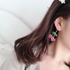 Fuchsia universal brand golden metal earrings heart-shaped