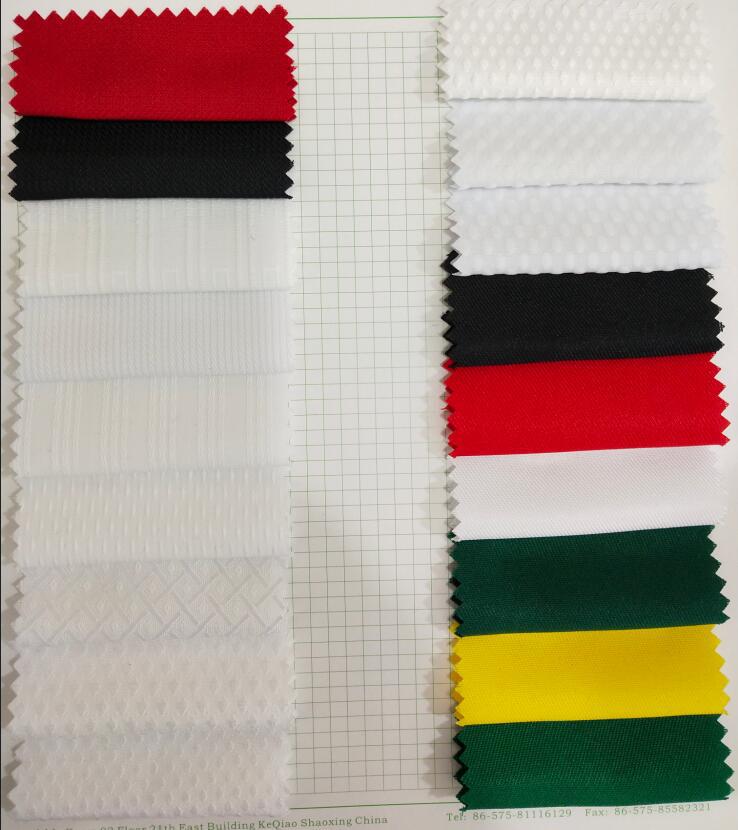 Tela de taekwondo colorida, patrón de diamante pequeño, stock disponible