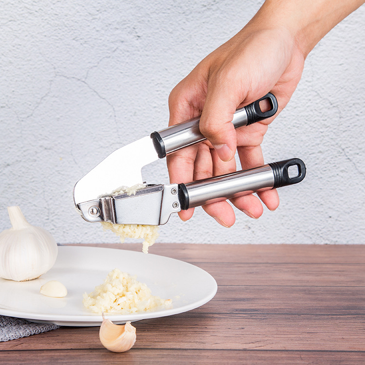 Factory wholesale 410 household garlic squeezer multifunctional garlic press mesh kitchen stainless steel gadget garlic paste