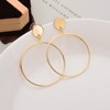 Simple and trendy golden silk geometric large circular round earrings are female fashion large hollow earrings