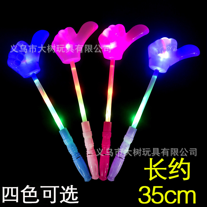Luminoso Victoria gesto forma Flash Stick pulgar forma palo de luz corona flash palo de juguete al por mayor