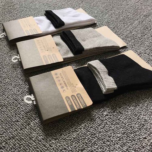 Customizable logo individually packaged cotton mid-calf sports socks men's solid color socks spring and autumn men's socks wholesale