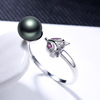 Glossy adjustable ring from pearl, Japanese and Korean, Korean style, on index finger