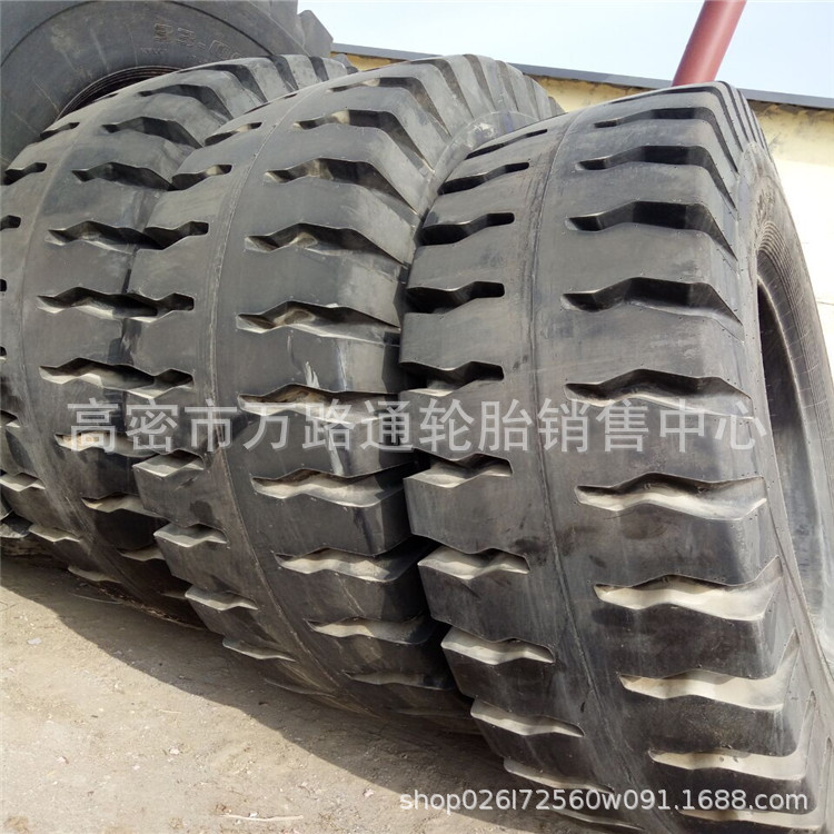 现货火炬矿用自卸车轮胎31/90-49 E4花纹 24.00-49R块状加深花纹