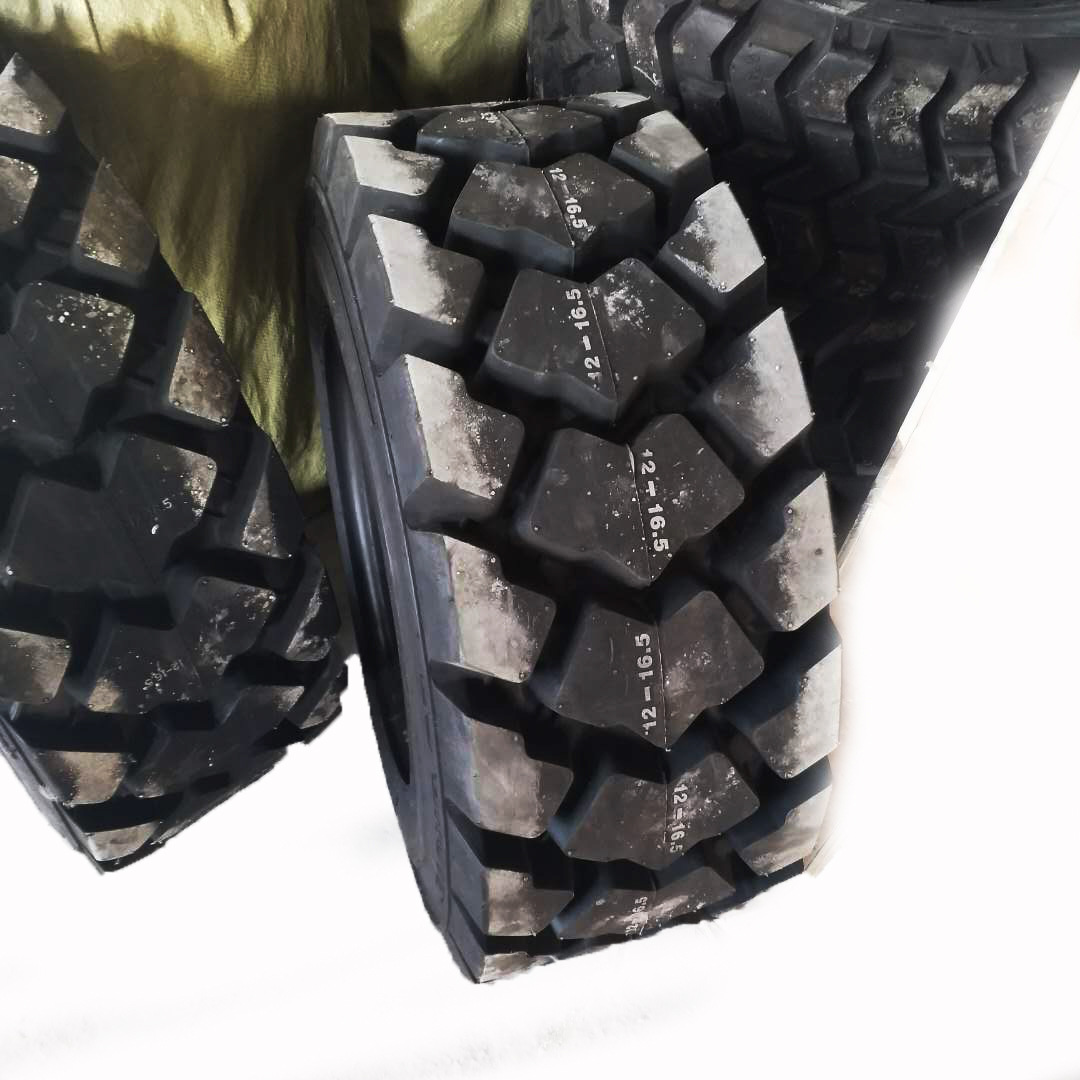 现货供应12-16.5矿用大花纹轮胎 金轮三包 带内胎垫带耐磨