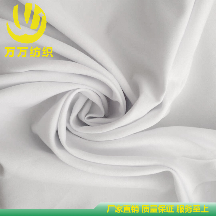 现货供应斜纹加密桃皮绒水蜜桃皇帝绒童装风衣沙滩裤面料批发