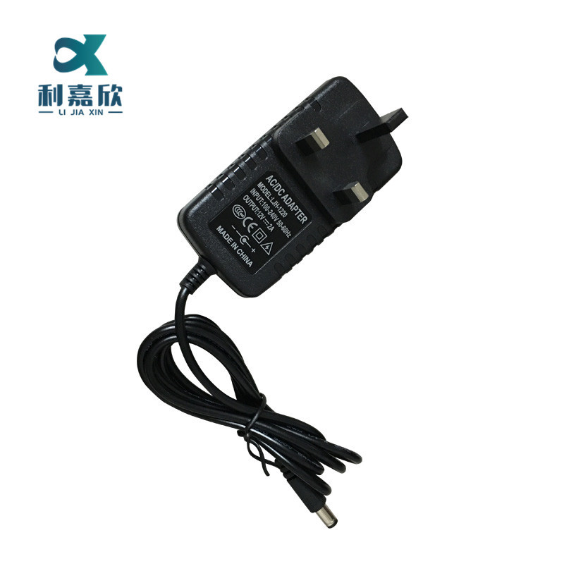 供应12v2a英规开关电源 监控电源 LED灯条电源适配器 路由电源