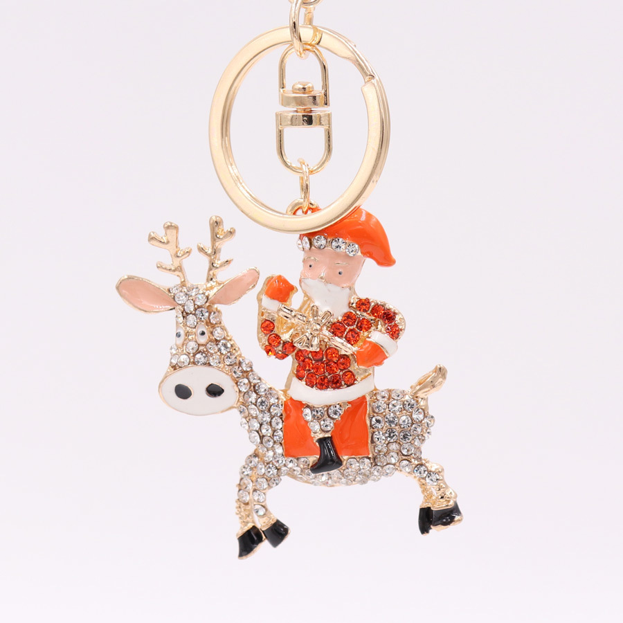 Nuevo regalo caliente aleación diamante gota aceite Navidad serie Santa Claus llavero colgante adornos regalo