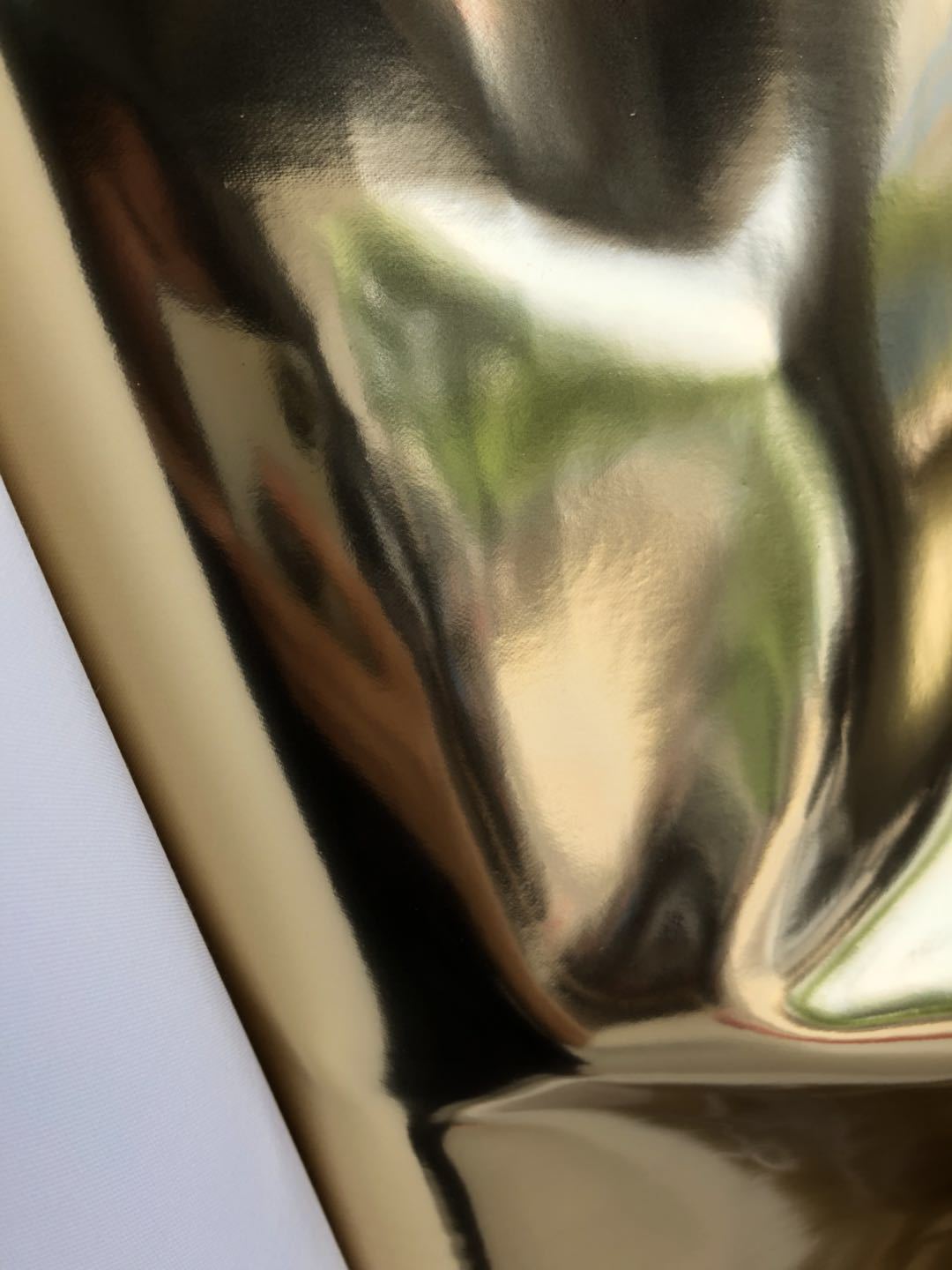 金色贴膜亮光镜面PU皮革箱包手袋鞋材玩具圣诞装饰革人造革