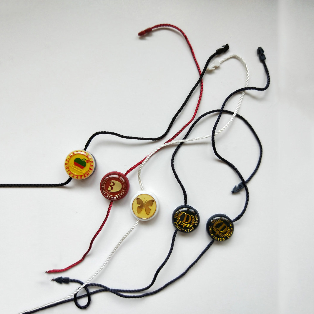 厂家供应男装品品牌吊粒烫金鞋帽箱包吊粒服装辅料