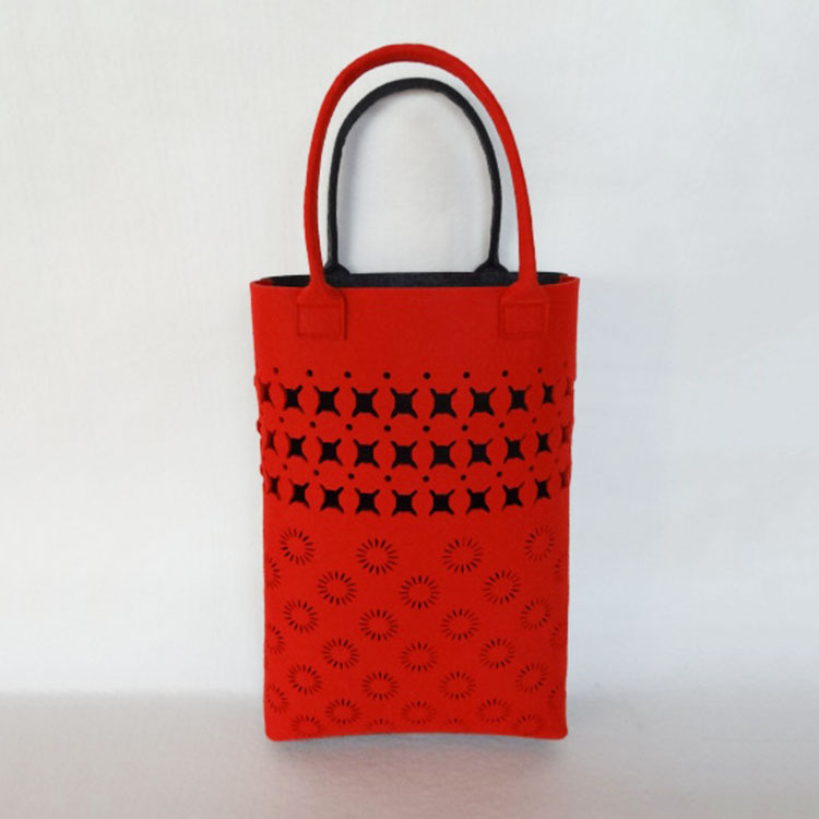 女士镂空毛毡包美观时尚女士手提毛毡包厂家毛毡包