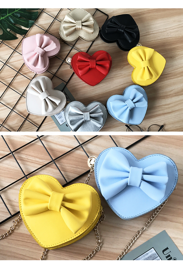 Unisex Small Pu Leather Solid Color Bow Knot Cute Heart-shaped Zipper Crossbody Bag display picture 2