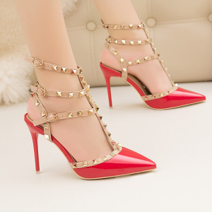 Thin heeled high heels patent leather metal rivet hollowed out Roman fashion sandals