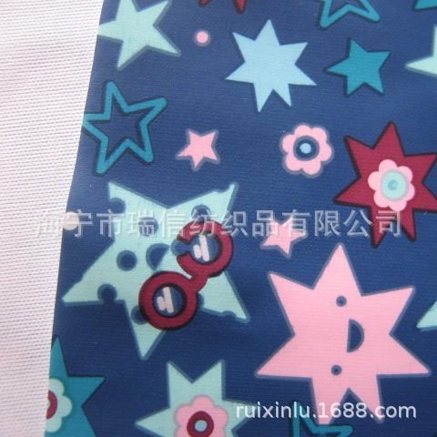 无铅无邻苯环保儿童雨衣面料 印花PU革 可高频焊接铁牛印花雨衣革