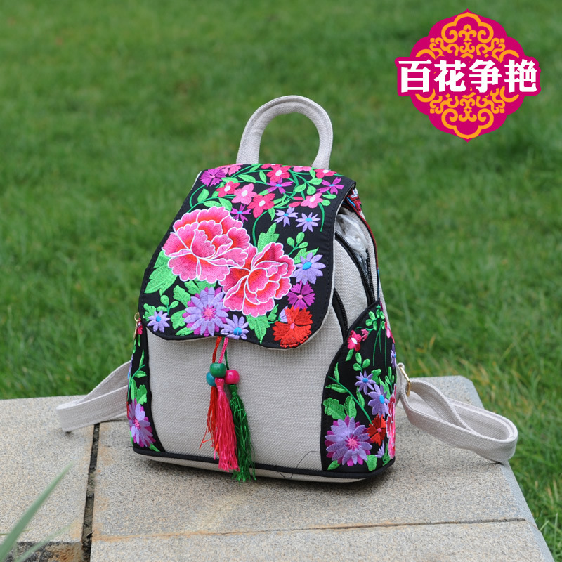 En stock 2023 verano nuevo estilo étnico bolsa de lona de las mujeres floral bordado bolsa casual mochila ventas directas de la fábrica