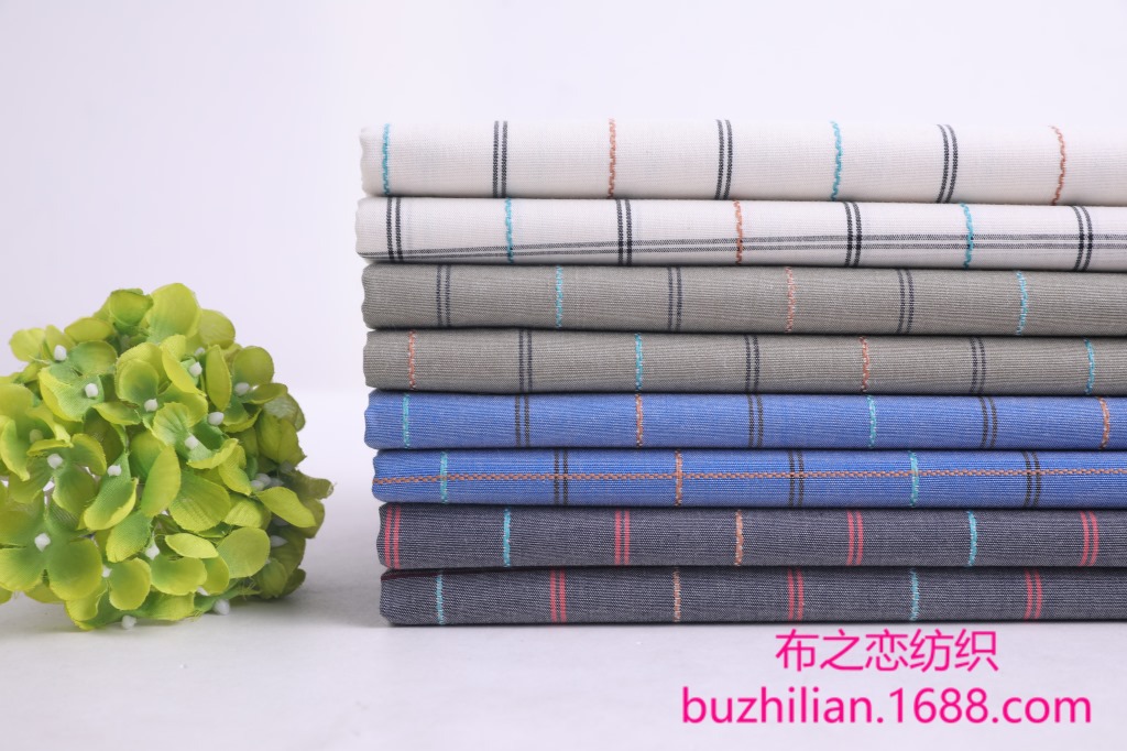 现货供应全棉梭织布 提花格条布 提花面料 时尚衬衫 休闲装等面料