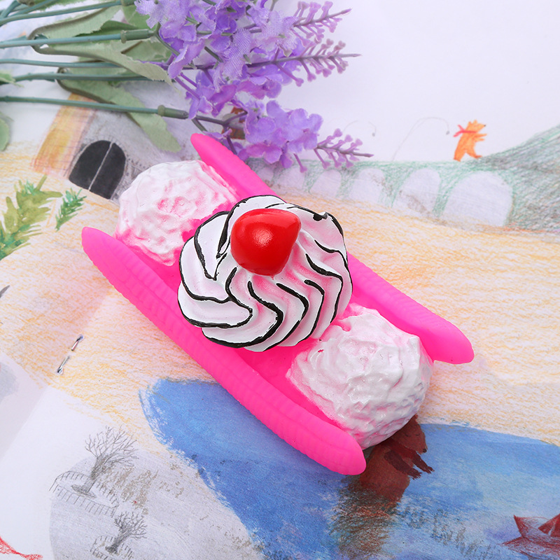 Fábrica al por mayor nuevo perro plátano fruta barco mordedura vinilo juguete mascota molar diente limpieza creativo perro divertido